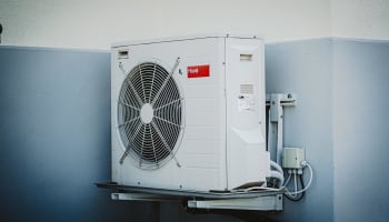 a white machine on a wall