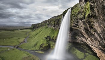 a waterfall over a cliff