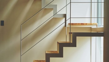 a wooden staircase in a room
