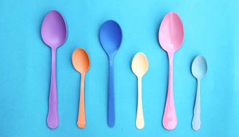 a group of plastic spoons