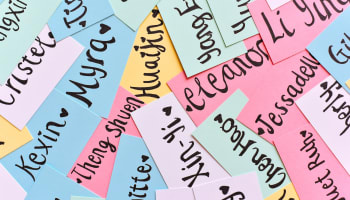 a pile of colorful cards with writing