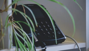 a telephone on a shelf