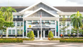 a building with a flag pole