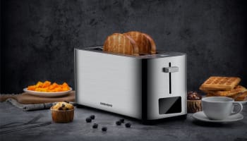 a toaster with toasted bread in it