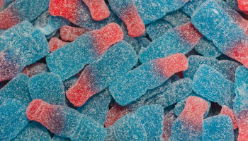 a group of blue and red candy