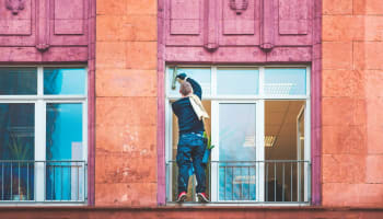 a person standing on a balcony