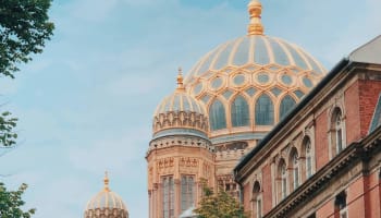 a building with gold domes
