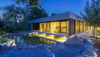 a house with a pool of water