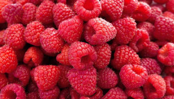 a pile of raspberries