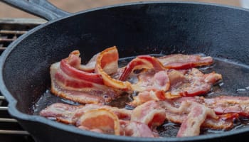 bacon cooking in a pan