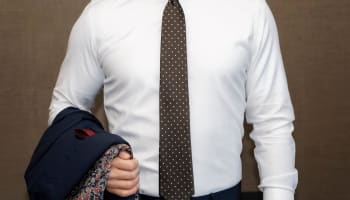 a person wearing a tie and a suit