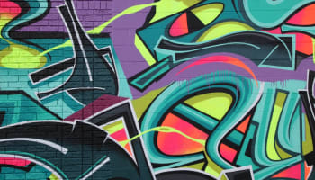 a wall with colorful graffiti