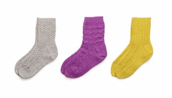 a group of different colored socks