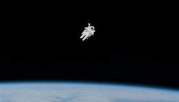 an astronaut floating in space
