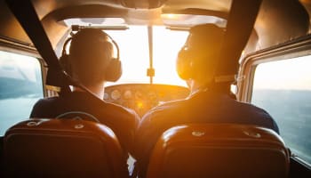 a group of men in a plane