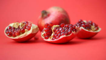 a pomegranate cut in half