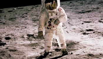 a astronaut walking on the moon