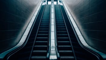 two escalators in a building