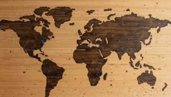 a map of the world on a wood surface