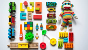 a group of toys on a white surface