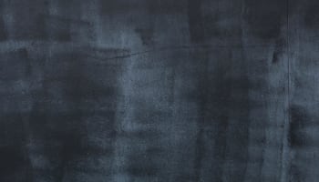 a black surface with a rough surface