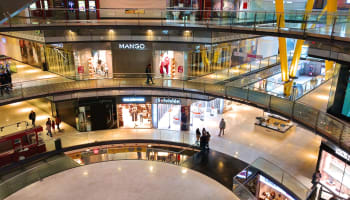 a group of people in a mall