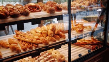 a display case with different types of bread