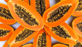 a group of cut up papaya