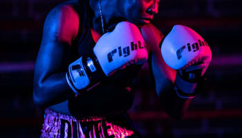 a person wearing boxing gloves