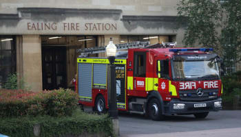 a fire truck parked in front of a building