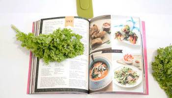 a book with a picture of salad