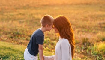 a person and a child touching noses