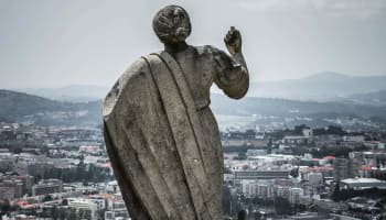 a statue of a person in a robe