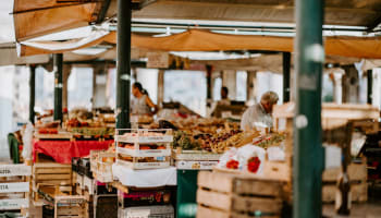 a market with fruit and vegetables