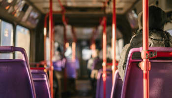 a person sitting on a bus