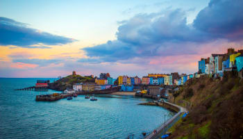 a body of water with buildings and boats on it