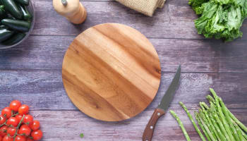 a cutting board and knife on a table
