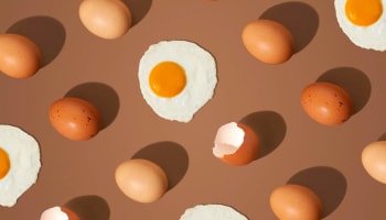 a fried egg surrounded by eggs