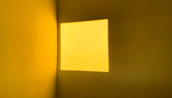 a yellow square in a corner