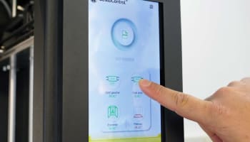 a finger touching a screen