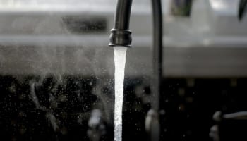 water coming out of a faucet