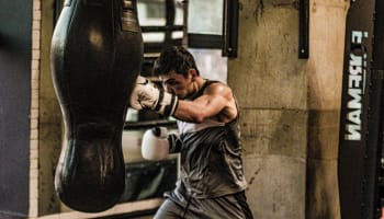 a person punching a punching bag