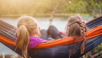 two children in a hammock