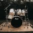 a drum set on a wood surface
