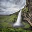 a waterfall over a cliff