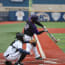 a baseball player swinging a bat