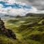 green hills with rocks