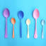 a group of plastic spoons