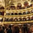 a group of people in an opera house