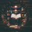 a book in the middle of a library